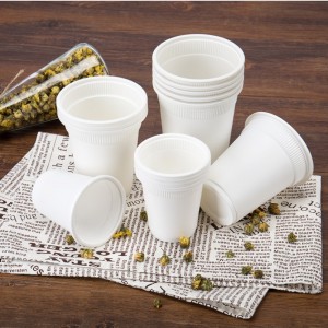 L\'ufficio dell\'amido di mais di PLA delle tazze di caffè compostabili amichevoli di Eco ha usato la tazza biodegradabile usa e getta della bevanda